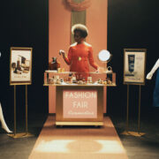 Documentary still image of woman at a fashion fair