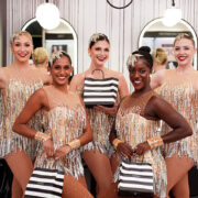 Rockettes holding Sephora shopping bags