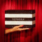 Hand holding Sephora shopping bag